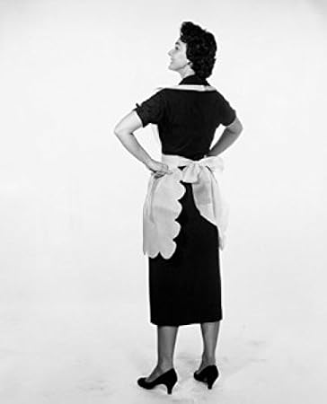 Posterazzi SAL25542061LARGE Studio Shot of Young Woman Standing with arms Akimbo Poster Print, 24 x 36