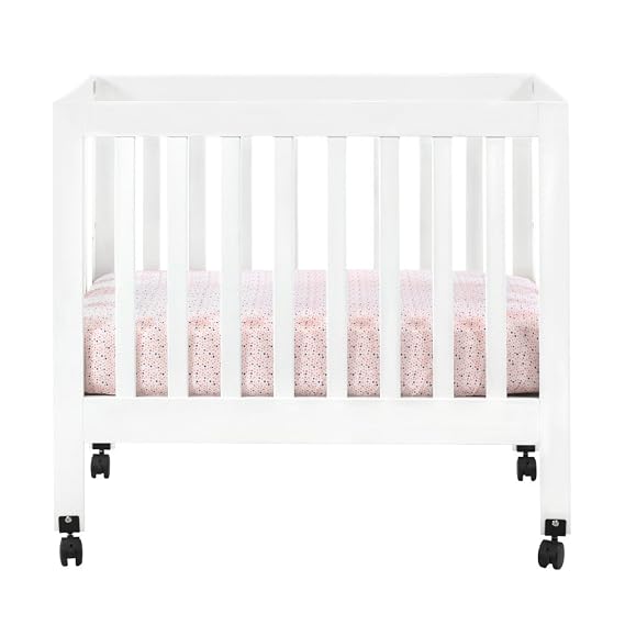 Babyletto Origami Mini Crib w Wheels & 1 Mattress Pad - Foldable & Converts to Twin Bed - Easy Assembly - GREENGUARD Certified - 2 Adjustable Mattress Heights - Conversion Kit Sold Separately, White