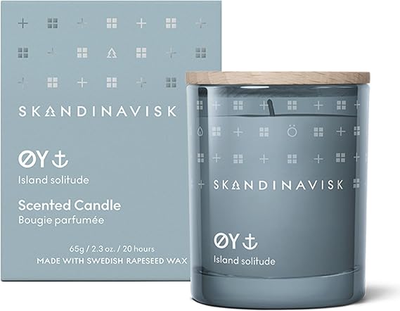 Skandinavisk ØY 'Island' Mini Scented Candle. Fragrance Notes: Crabapple and Dog Rose, Water Mosses and Green Leaves. 65 g.